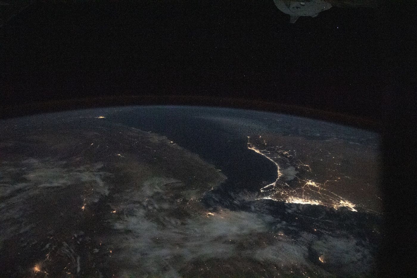 The Gulf and its coastal cities at night, photographed from the International Space Station